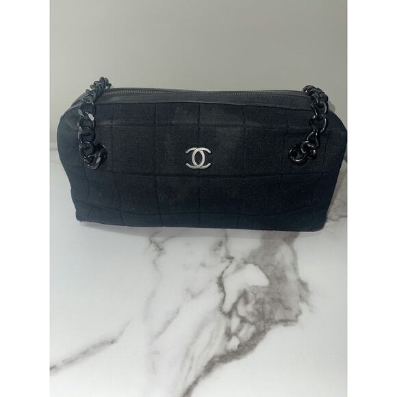 CHANEL Handbags - Chanel Black Fabric Quilted Handbag with Silver CC Logo